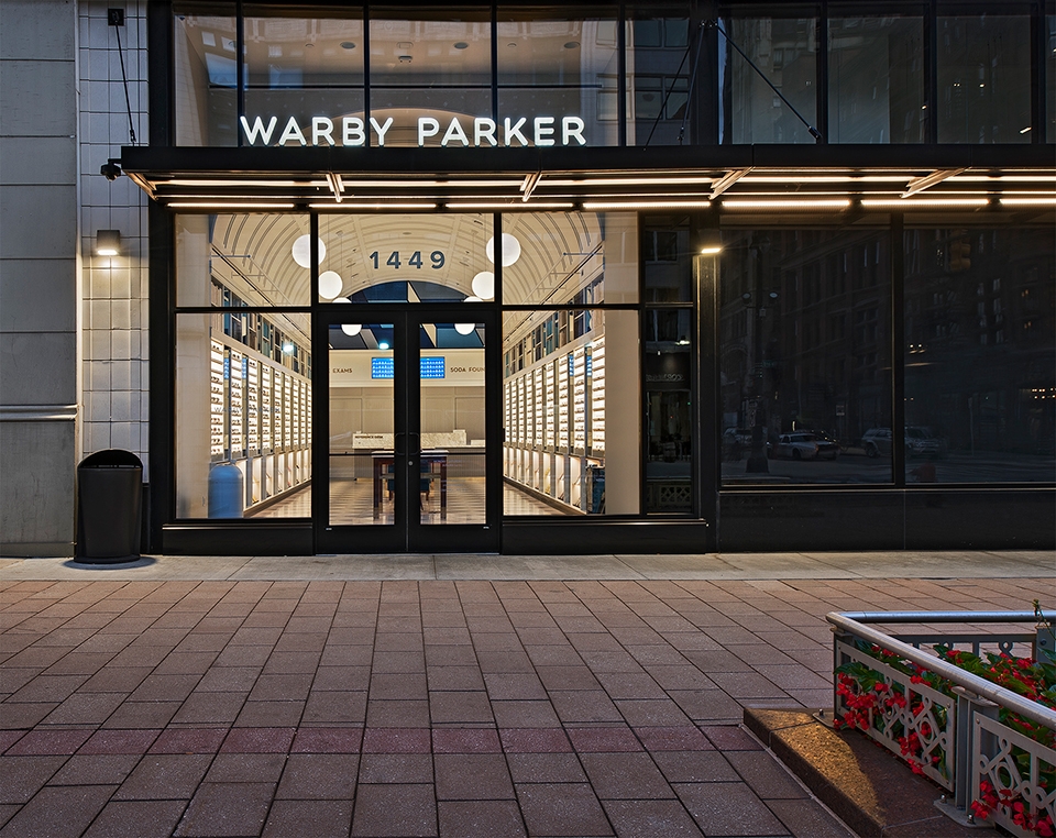 A photo of the outside of a Warby Parker store